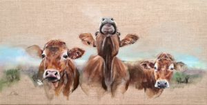 trois vaches et une fleur